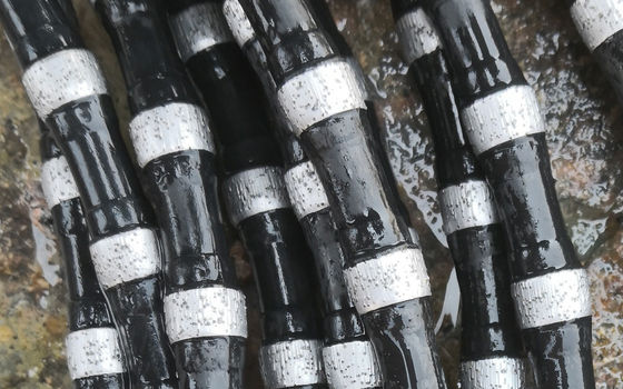 11.5mm de caucho de resorte de diamantes de alambre de sierra para la extracción de la minería de mármol de corte de diamantes cuentas de cuerda